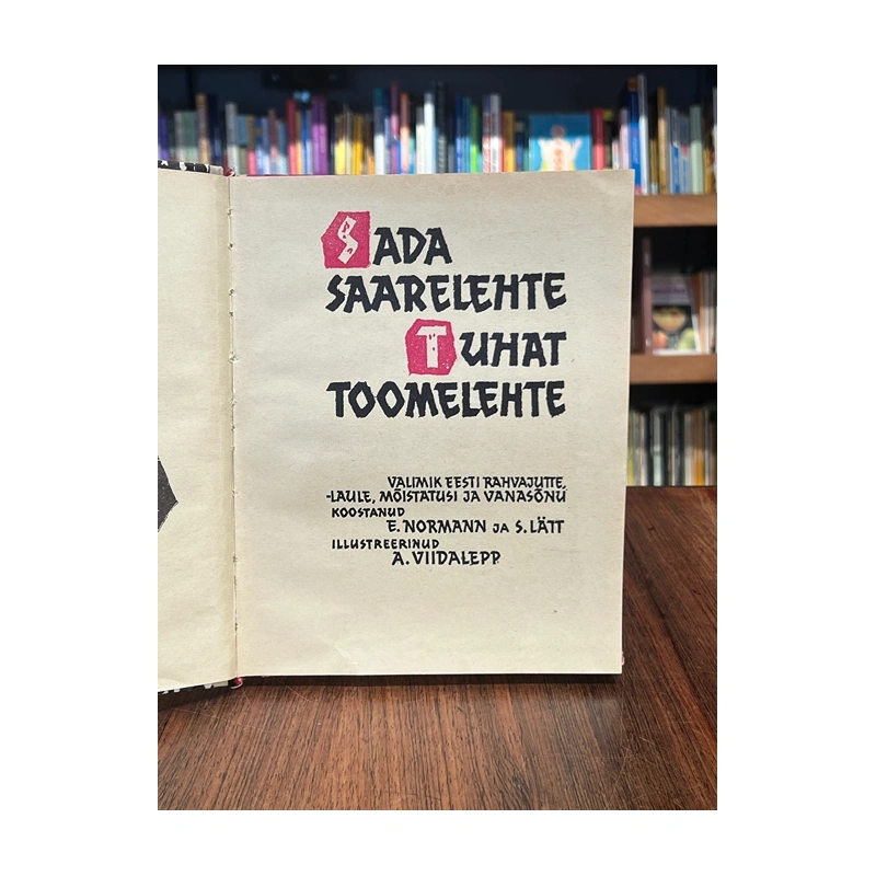 kasutatud-raamat-sada-saarelehte-tuhat-toomelehte-normann-latt-tiitelleht.webp